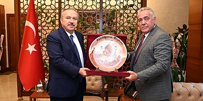 ÜSTÜN BAŞARILAR DİLEDİ..